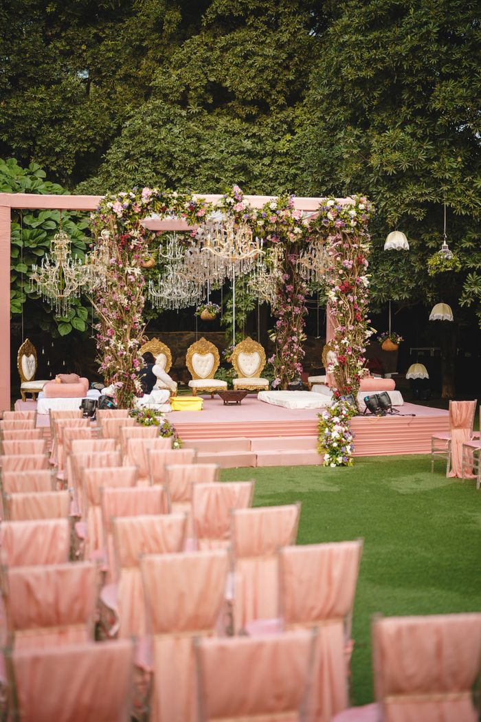 Mastering the First Impression: Your intriguing post title goes here Romantic outdoor wedding ceremony with floral arches and elegant seating on a sunny day.